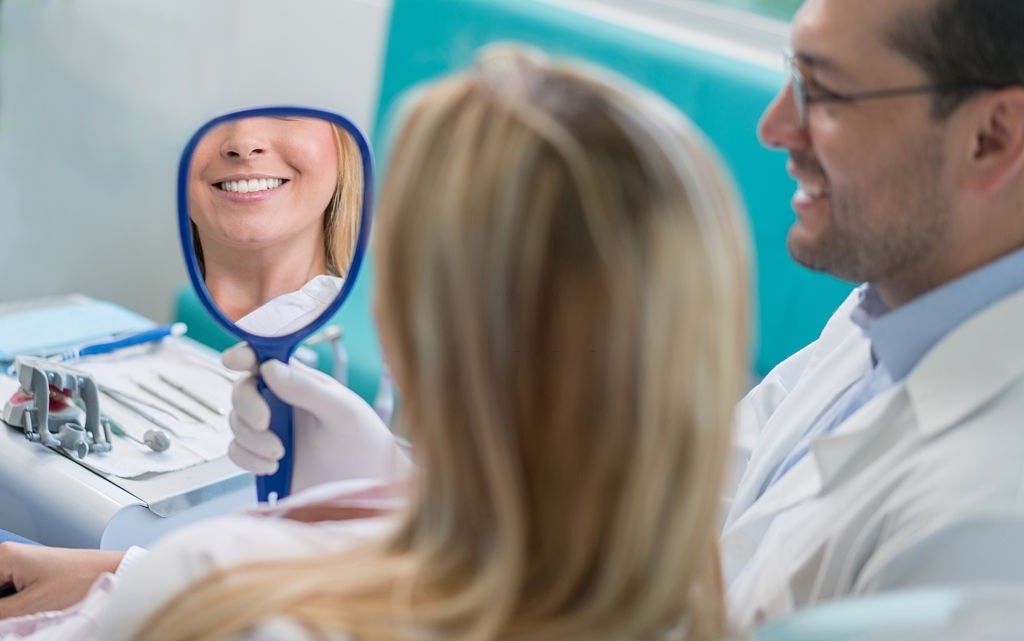 Woman getting a smile design at the dentist